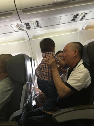 Tuck Soon on plane